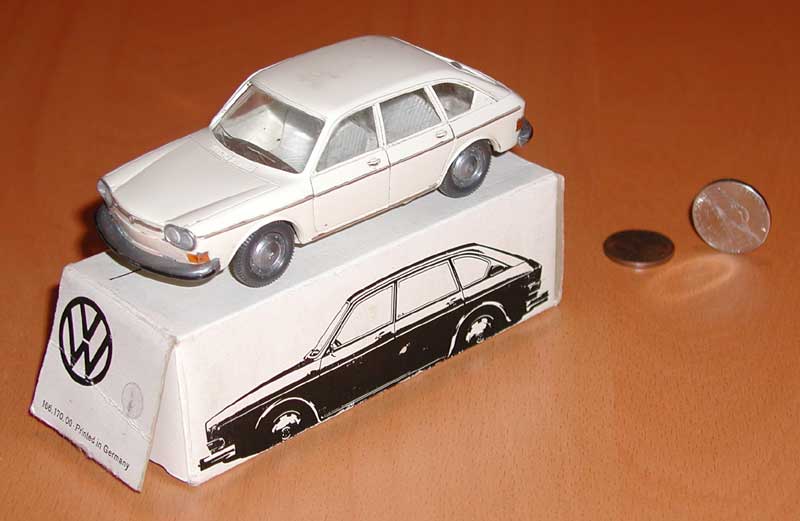 White 411 sedan from Cursor