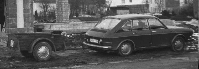 4-door sedan with trailer